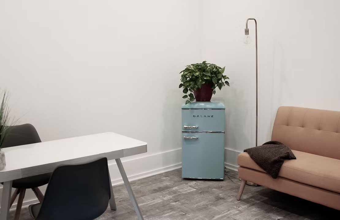 Comfortable salon lounge at Karmaic Beauty Newport