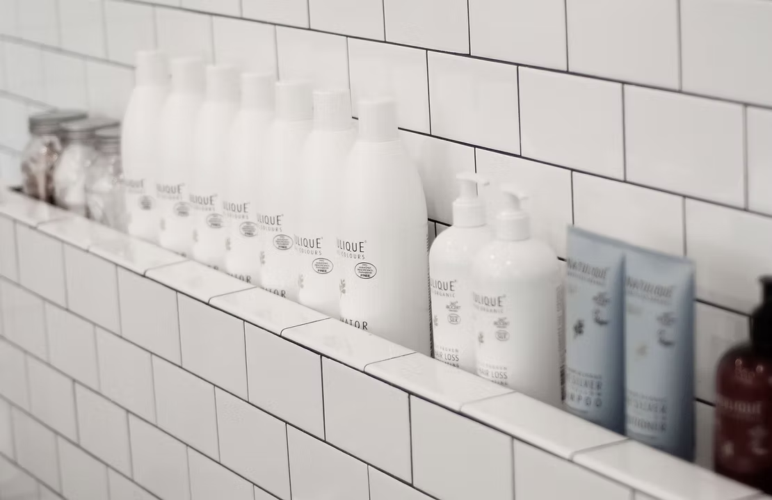 Organic hair products display at Karmaic Beauty